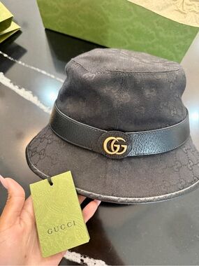 Brand new Gucci Black GG Monogram Bucket Hat with Leather Band and Gold GG